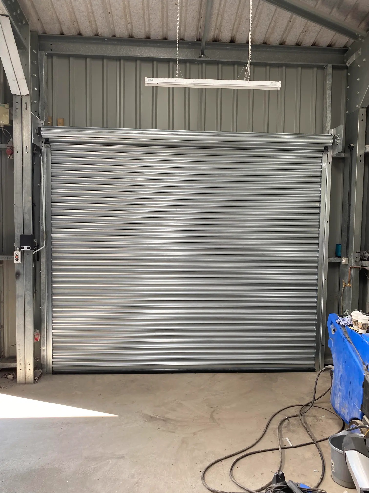 Electric roller shutter conversion on a commercial unit